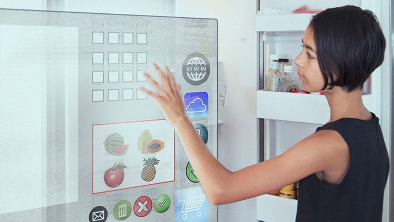 a person standing in front of a microwave