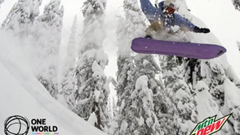 a man flying through the air on a snow board