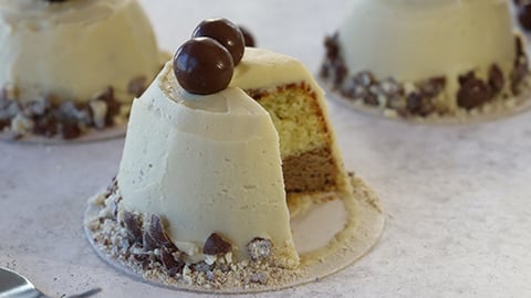 a close up of a piece of chocolate cake on a table