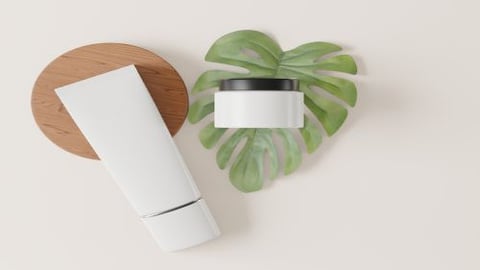 sustainable beauty products on green leaf