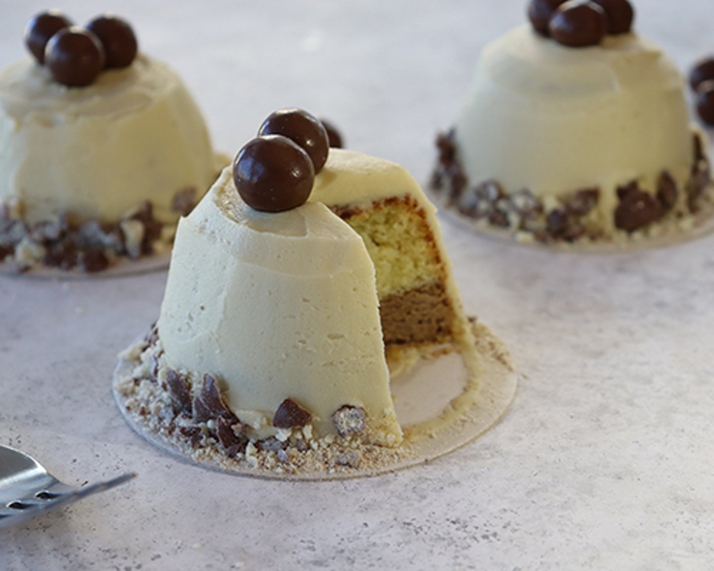 a close up of a piece of chocolate cake on a table