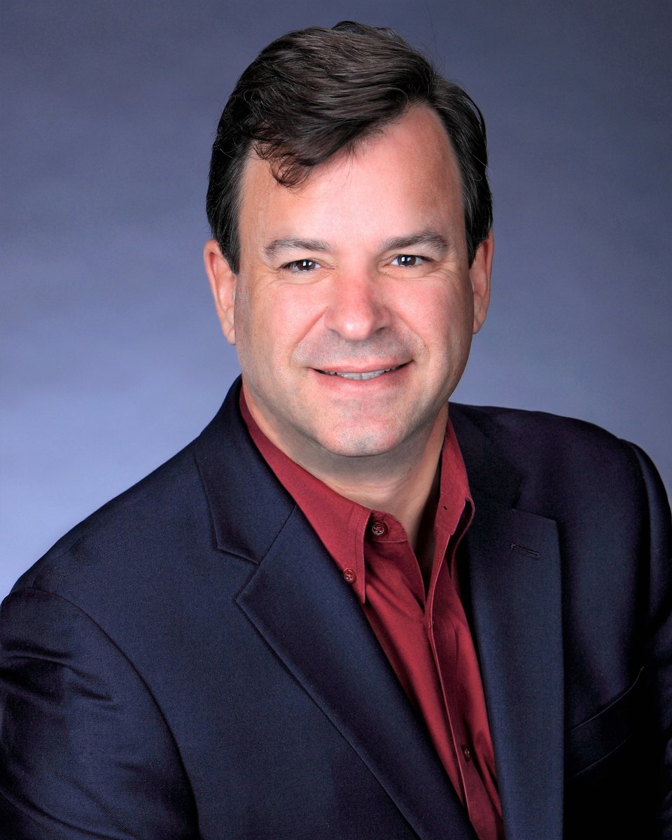 a man wearing a suit and tie