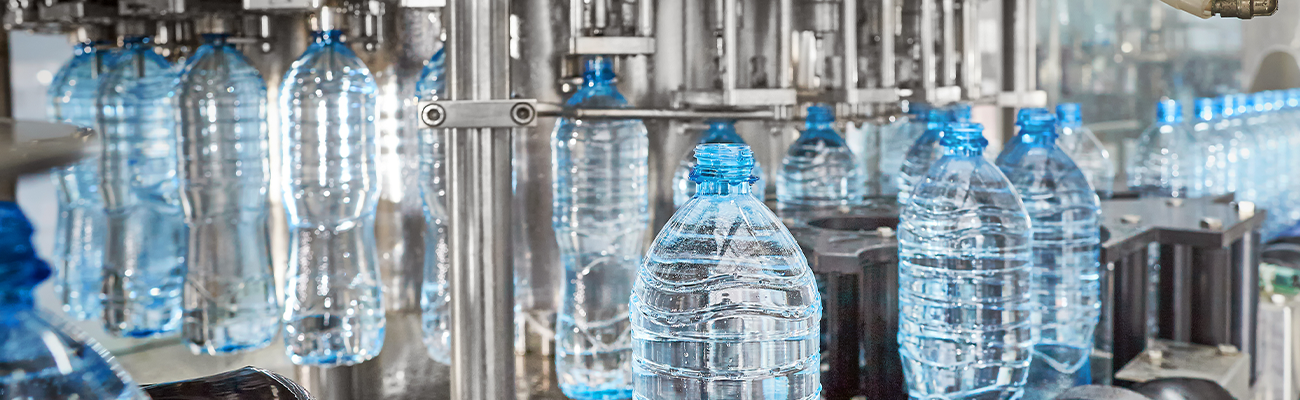 a group of glass bottles on a table