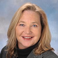 a woman smiling for the camera