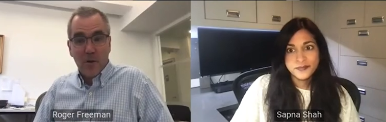 a man smiling for the camera